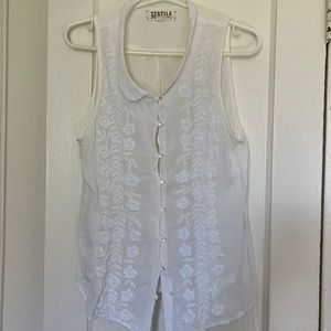 Embroidered white sleeveless top